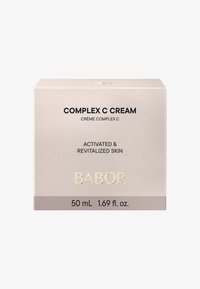 Crème C Complex Babor dans une boîte beige clair avec des accents dorés. Texte avant : "Peau activée et revitalisée", taille 50 mL, 1,69 fl. oz.