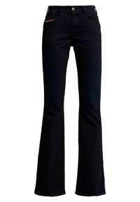 Mörk tvättade utsvängda jeans i denim, med knappstängning, femfickorsdesign och diskret branding på framfickan.