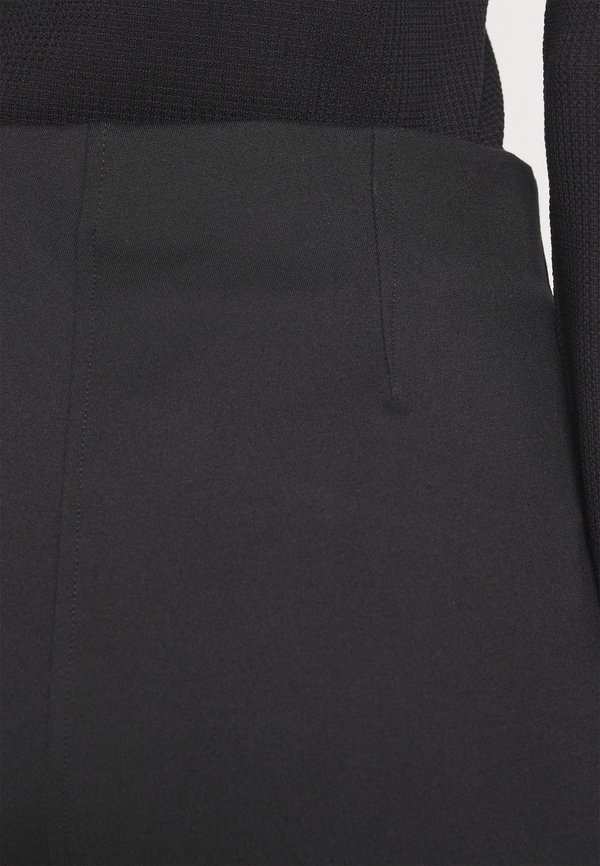 FLARED TROUSERS - Trousers2