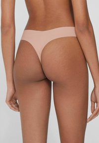 Tezenis MIT HOHEM BEINAUSSCHNITT AUS NAHTLOS  - String - hellrosa powder rose