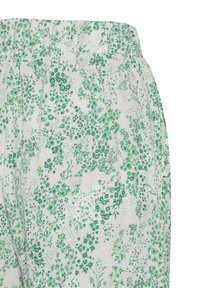 Tejido ligero con estampado floral en tonos verdes sobre un fondo blanco. Presenta una cintura elástica y suaves pliegues.