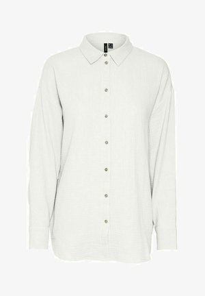 Gai pelēks krekls ar apkakli, garām piedurknēm, teksturētu audumu un sešiem metāliskiem pogām priekšpusē.