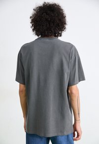 Carhartt WIP DUSTER SCRIPT - Basic T-shirt - black
