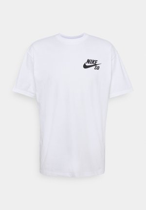 T-shirt blanc à manches courtes avec logo Nike SB noir sur la poitrine gauche, col rond et coupe décontractée.
