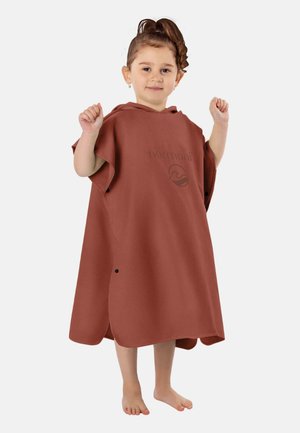Rust-colored poncho made of soft fabric, featuring a hood and short sleeves. Displays the brand name "normani" and a wave logo.