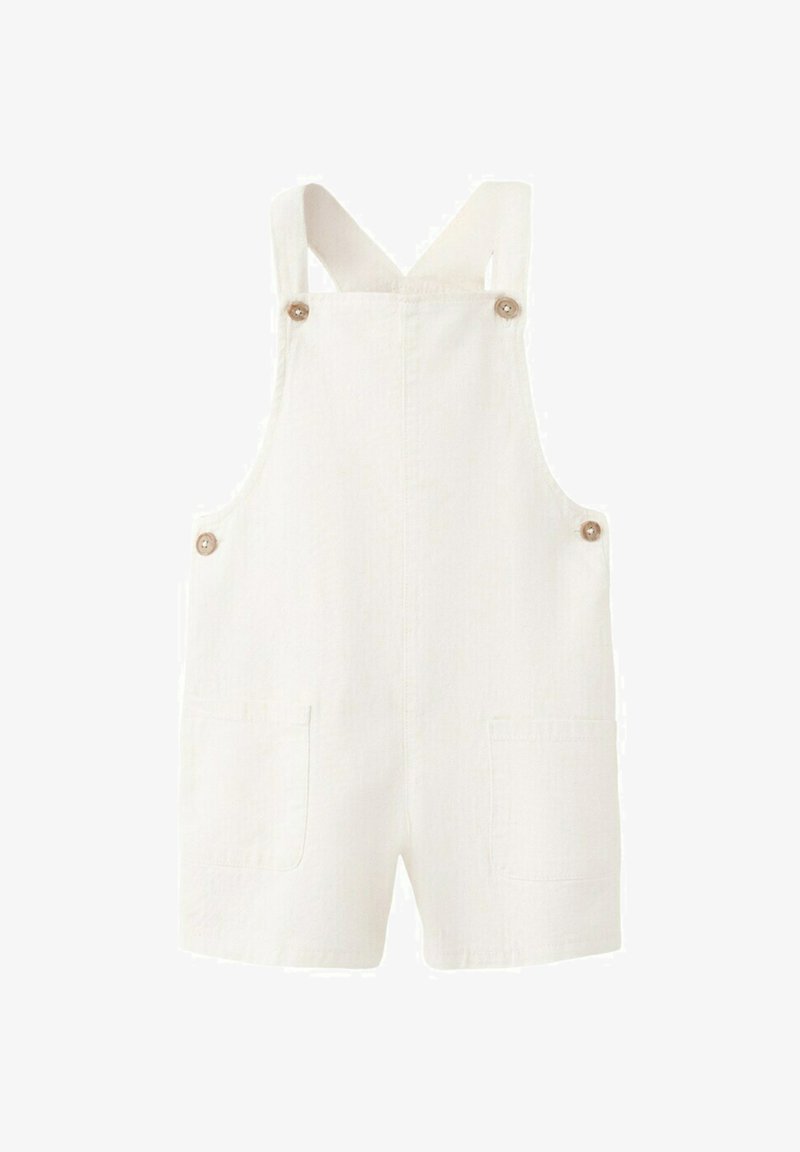 Salopette courte en lin blanc avec poches avant et bretelles réglables à boutons.