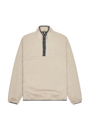 Sudadera de forro polar beige con media cremallera, presenta una tapeta de botones en azul oscuro y un dobladillo y puños en un contraste azul oscuro. Logo sutil en el pecho.