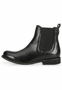 Stivale alla caviglia in pelle nera con pannelli laterali elasticizzati, punta arrotondata e tacco basso impilato. Texture liscia con un design minimalista.