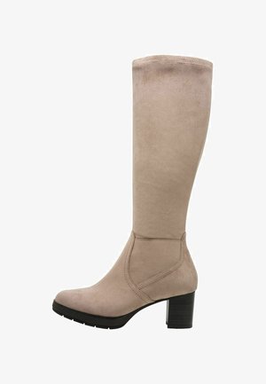 Beige knee-high boot with a smooth suede texture, block heel, and a rounded toe. Features stitched accents along the side.