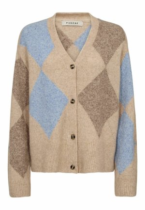 Bež jopica z V-izrezom, z motivom diamantov v svetlo modrih in rjavih tonih. Ima rebrast rob in tri rjave gumbe.