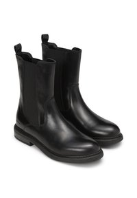 Stivali alla caviglia in pelle nera con pannelli laterali elasticizzati, punta rotonda e tacco basso impilato. Presentano anelli per il pull-on per indossarli facilmente.