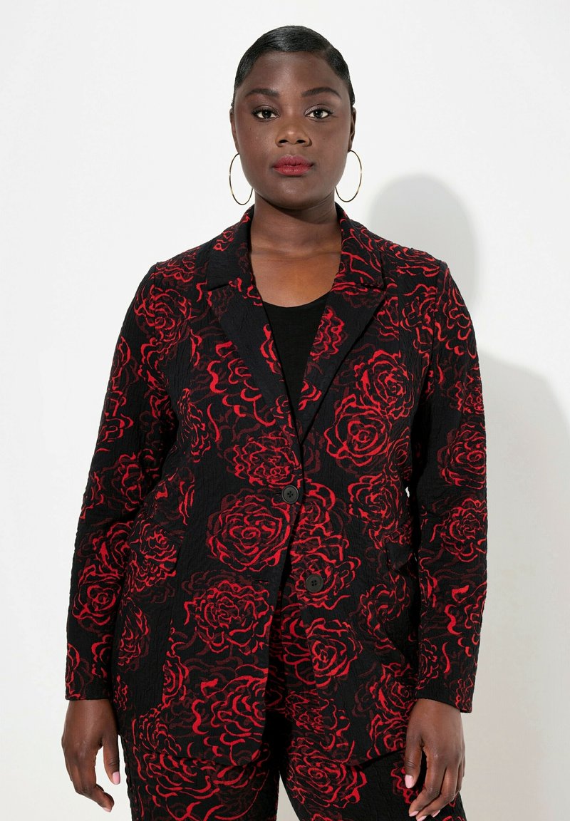 Černý blazer s výrazným červeným květinovým vzorem, s jednořadovým zapínáním na knoflík, s klopami, texturovanou látkou a dvěma předními kapsami.