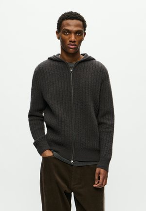 Knit-Hoodie in Anthrazitgrau mit geripptem Design, Frontreißverschluss und Kängurutasche. Mit langen Ärmeln und einem lockeren Schnitt.