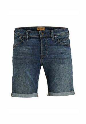 Temnoblu jeans kratke hlače s zavihanimi hlačnicami. Imajo pet žepov, zadrgo in gumbe ter diskretne šive.