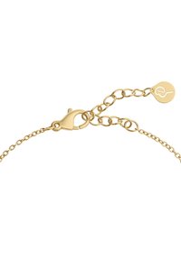Gold chain bracelet featuring a lobster clasp and an adjustable chain with a small tag displaying a distinctive design.