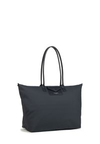 Borsa tote blu scuro con due manici lunghi, realizzata in tessuto resistente. Presenta una chiusura a zip e una piccola tasca decorativa sulla parte anteriore.