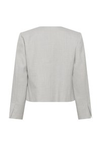 Blazer pour femme gris clair sur mesure, manches longues, épaules structurées et ourlet court, vu de dos.