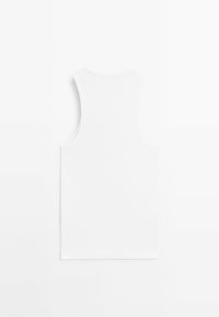 Hvid ærmeløs tanktop lavet af bomuld. Har en rund halsudskæring og subtil tekstur, med et rent, enkelt design.