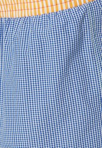 Unabux Široké boxerky - blue/white
