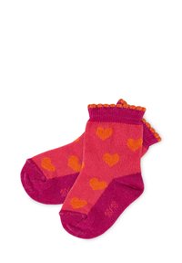 Pink and orange heart-patterned socks with a ruffled top edge. Made of soft cotton blend, featuring a seamless toe design.