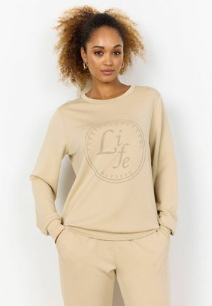 Felpa beige con scollo rotondo, maniche lunghe e un motivo centrale stampato che presenta la parola "Vita" e testo decorativo.