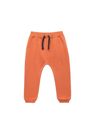 - Spodnie materiałowe