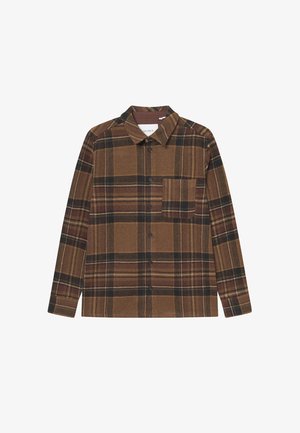 Ruskea ruutupaita, joka on valmistettu pehmeästä kankaasta, pitkät hihat, napitus, kaulus ja yksi rintatasku, jossa on monivärisiä raitoja.