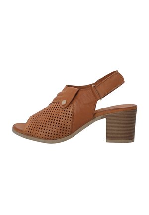 Brown leather slingback sandal with perforated design, open toe, and 3-inch stacked heel. Features a button accent and cushioned insole.