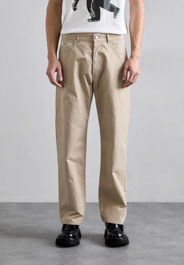 INSTITUTIONAL - Trousers - beige