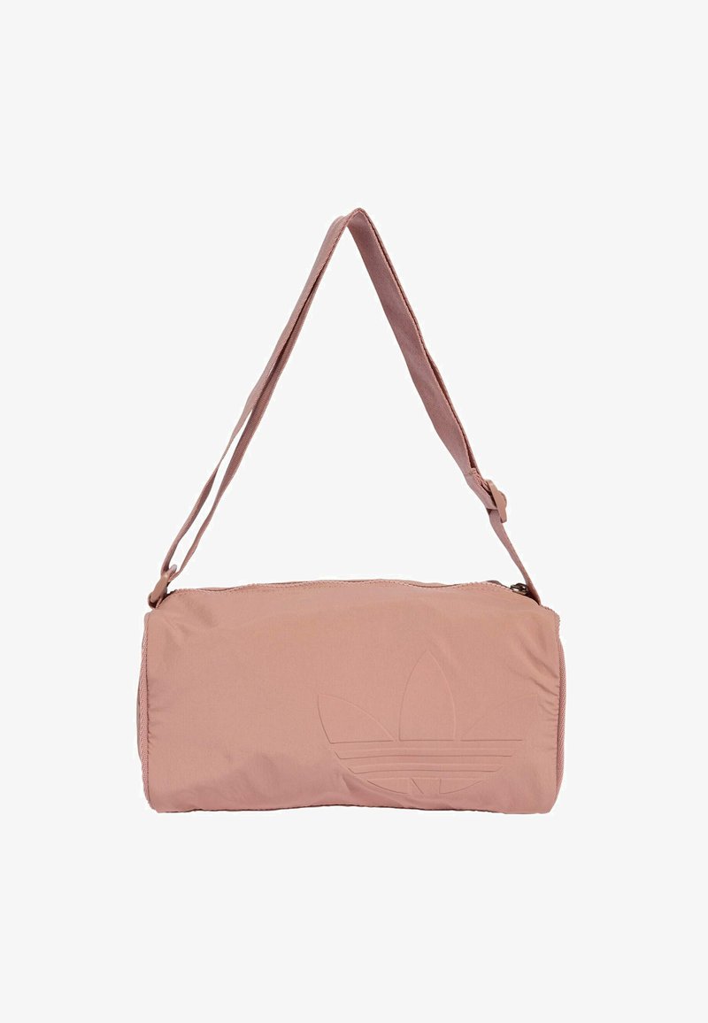 Ružový športový vak s nastaviteľným popruhom, zipsovým uzáverom a embosovaným logom. Vyrobený z hladkej tkaniny s valcovým tvarom.