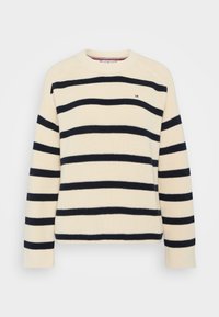 Maglione beige a maglia con strisce orizzontali nere e collo a giro. Presenta polsini e orlo a costine, con un piccolo logo sul petto.