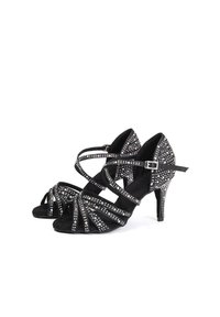 Black suede high-heel sandals with crisscross straps and studded accents. Open-toe design and a slender heel complete the look.
