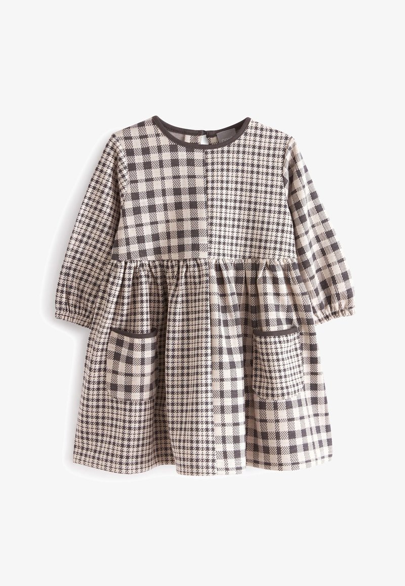 Robe à manches longues pour tout-petit avec motifs mêlés pied-de-poule noir et blanc et à carreaux, dotée de deux poches avant et d'un col rond.