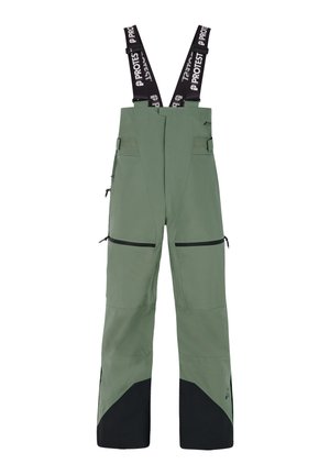 Grønne vandtætte bibtights med justerbare sorte seler, flere lynlåslommer, sorte forstærkede nederste paneler og en glat, holdbar tekstur.