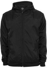 Black lightweight jacket with a hood, front zipper closure, elastic cuffs, and two side pockets. Smooth texture and minimal design.