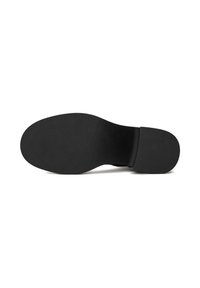 Talpa de pantof neagră, cu un grip din cauciuc texturat, având o curbă netedă la călcâi și fără branding sau modele vizibile.