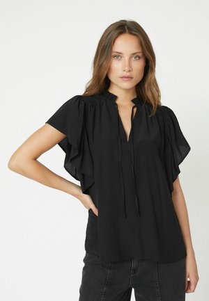 Black blouse with short, flutter sleeves, a V-neck, and gathered detailing around the neckline. Made of a lightweight fabric.
