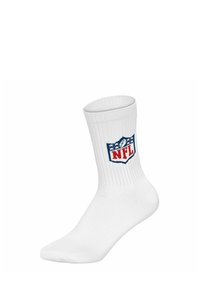 Weißer Sportsocken mit geripptem Muster, versehen mit einem blauen und roten NFL-Logo in Schildform. Standard Crew-Länge.