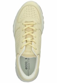 Light yellow sneaker with perforated leather upper, round toe, and flat laces. Features soft inner lining and cushioned sole.
