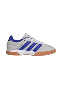 Gray suede sneakers with blue accents, featuring three blue stripes, white laces, and a gum sole. "SPECIALIST" text in gold on the side.
