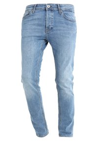 Ljusblå denimjeans med slim fit, fem-fickorsdesign och en knappstängning med dragkedja. Tyget har en mjuk, texturerad yta.