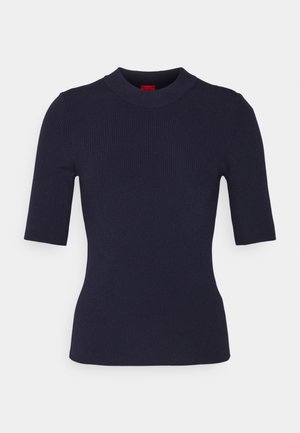 Top corto a maniche corte in maglia di colore blu navy con collo alto e design aderente, realizzato in un tessuto elasticizzato. Superficie liscia e finitura pulita.