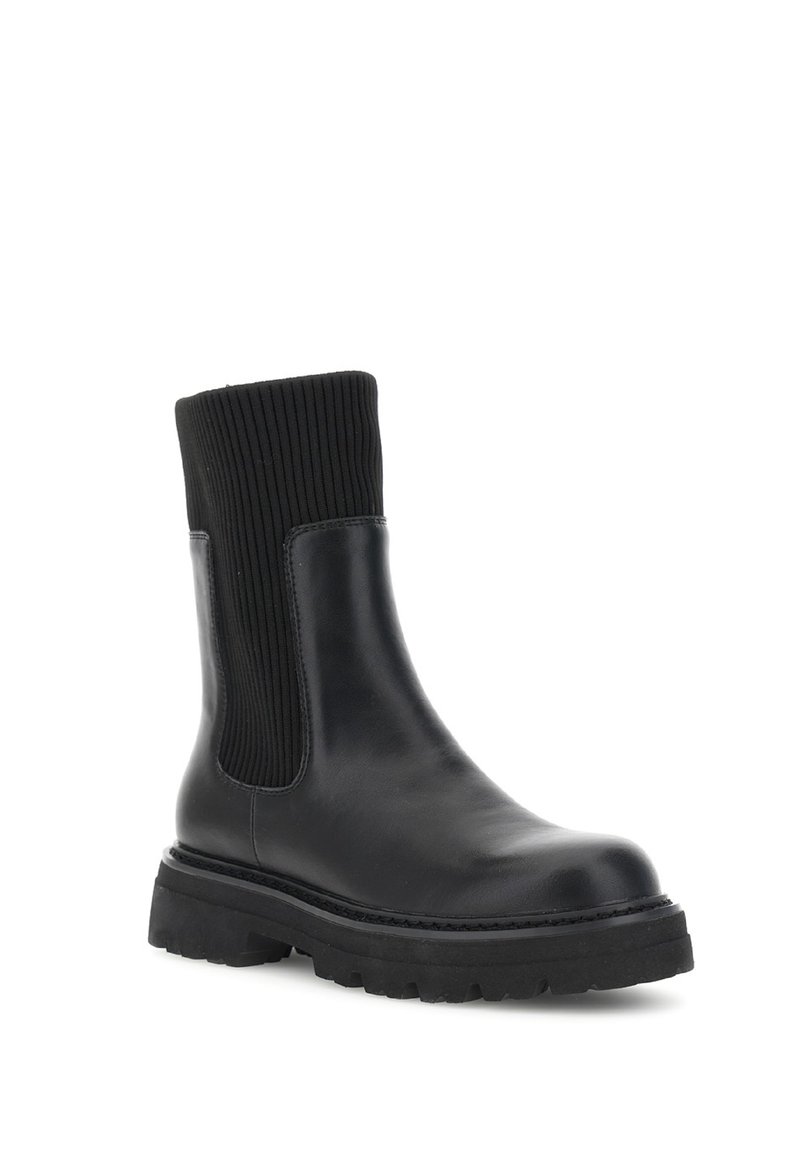 Schwarze Knöchelstiefelette aus glattem Leder mit einem gerippten Stoffschaft. Sie hat eine robuste Gummisohle für guten Halt und Langlebigkeit.