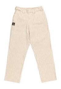 Beige pants with vertical text pattern, featuring a belt loop, side pockets, and a black brand label on the left side.