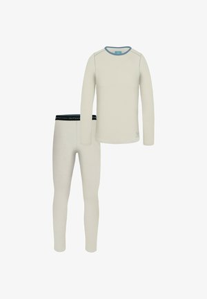 Set aus cremefarbenem Funktionsunterhemd und Leggings. Das Oberteil hat lange Ärmel und einen Rundhalsausschnitt, während die Leggings einen schwarzen, gebrandeten Bund besitzen.