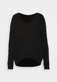 Maglione nero lavorato a maglia con scollo a V ampio, maniche lunghe e una vestibilità rilassata. L'orlo è curvo, creando una parte posteriore più lunga rispetto a quella anteriore.