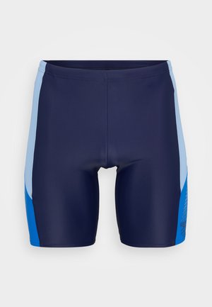 Tamsiai mėlyni maudymosi šortai su šviesiai mėlynomis šoninėmis juostelėmis. Pagaminti iš lygaus, elastingo medžiagos. Vienoje pusėje turi geometrinį raštą.