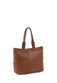Bruine leren shopper met twee handvatten en zichtbare stiksels op een glad oppervlak, getoond tegen een witte achtergrond.