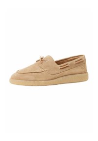 Beige Wildleder-Bootsschuhe mit niedrigem Profil, runder Zehenform und Schnürdetails. Verfügt über eine strukturierte Gummisohle für besseren Halt.