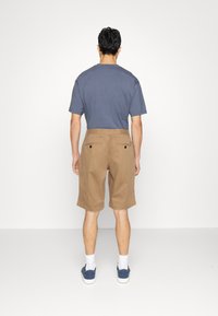 Tommy Hilfiger HARLEM - Shorts - classic khaki
